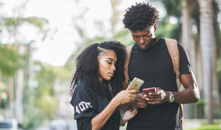 Couples looking on each other's phones